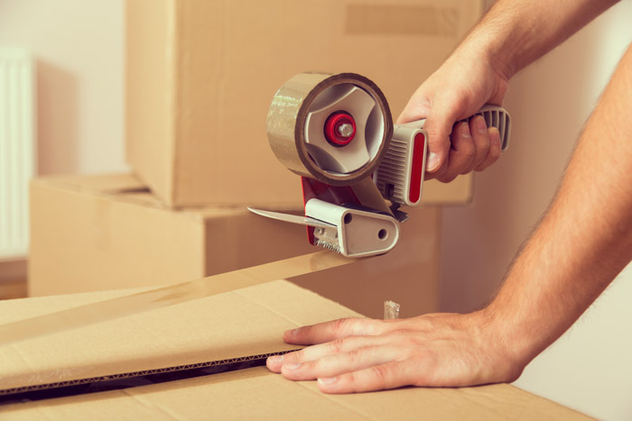 sealing moving box with tape
